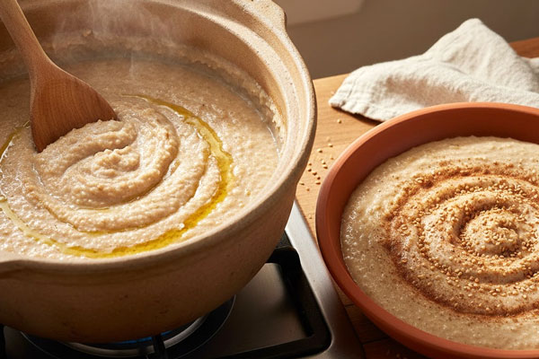 مخلوط کردن گوشت، پور گندم و پخت حلیم