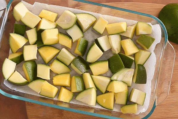Layer-the-salted-mangoes-on-a-large-glass.png.webp