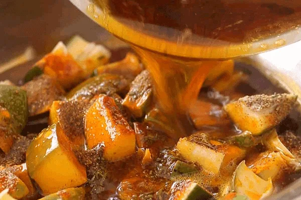 mixing-mango-with-olive-oil.png.webp