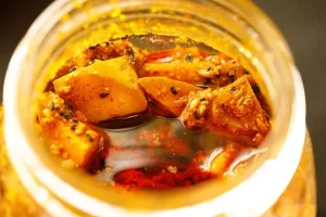 روغن شناور در ترشی انبه