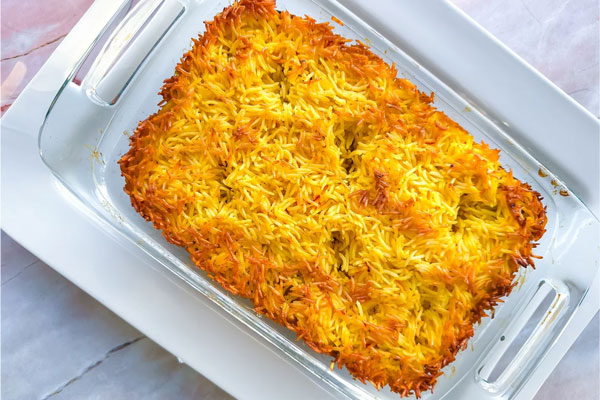 ته چین مرغ با گرد غوره پخته شده در فر